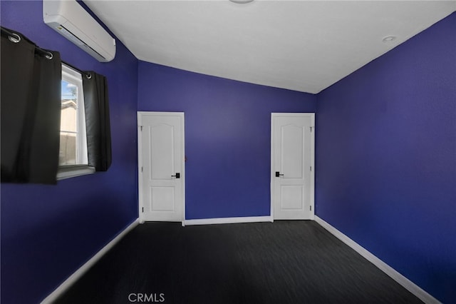 15064 Marcolesco St, Lake Elsinore, CA 92530 - unfurnished room featuring baseboards, lofted ceiling, and a wall mounted air conditioner