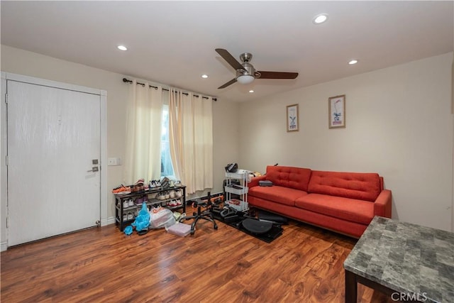 living room featuring ceiling fan, wood finished floors, and recessed lighting