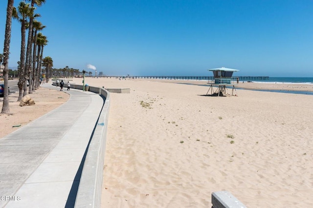 view of water feature with a beach view