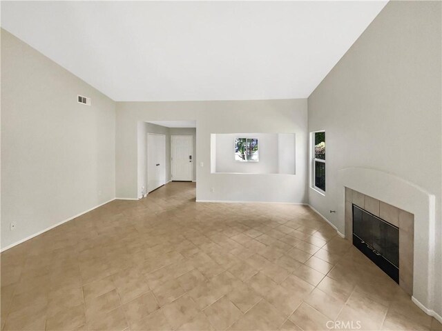 103 Buckthorn Way, Corona, CA 92881 - unfurnished living room featuring a fireplace and high vaulted ceiling