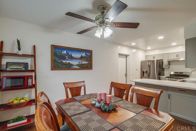 dining space featuring a ceiling fan and recessed lighting
