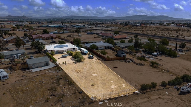aerial view with a mountain view and a desert view