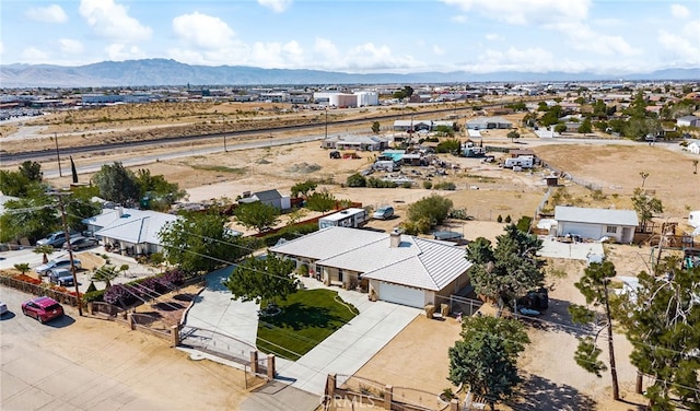 drone / aerial view featuring a mountain view