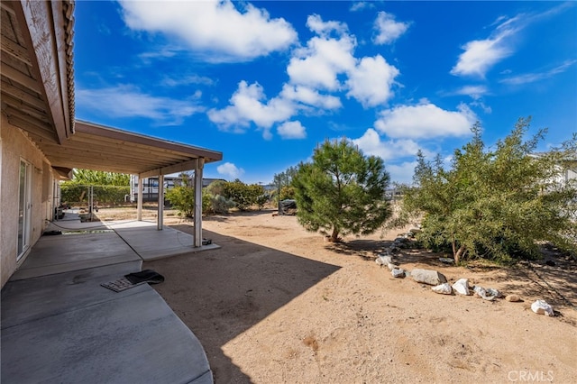 view of yard featuring a patio