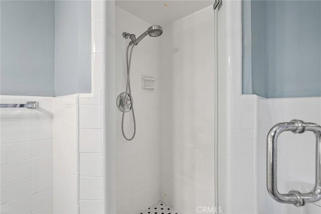 1130 E 1st St Unit 205, Long Beach, CA 90802 - bathroom with a wainscoted wall and a shower stall