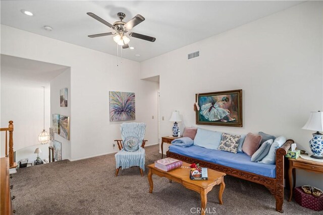 living area featuring visible vents, a ceiling fan, carpet flooring, and recessed lighting