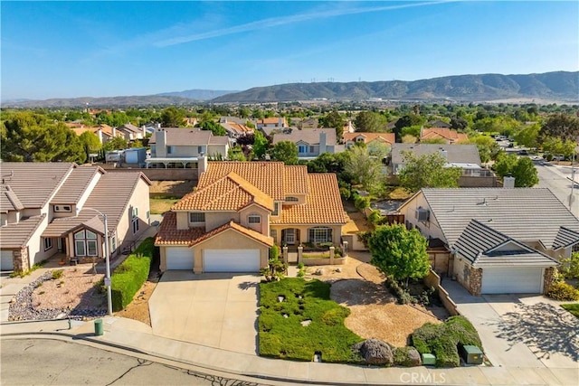 bird's eye view with a mountain view and a residential view