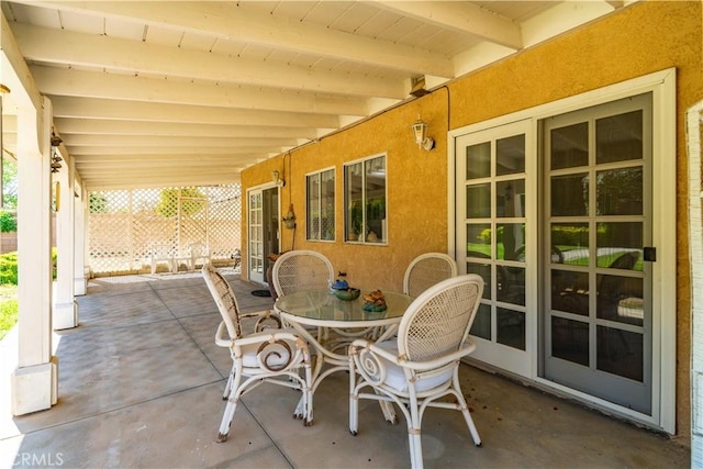 view of patio featuring outdoor dining space