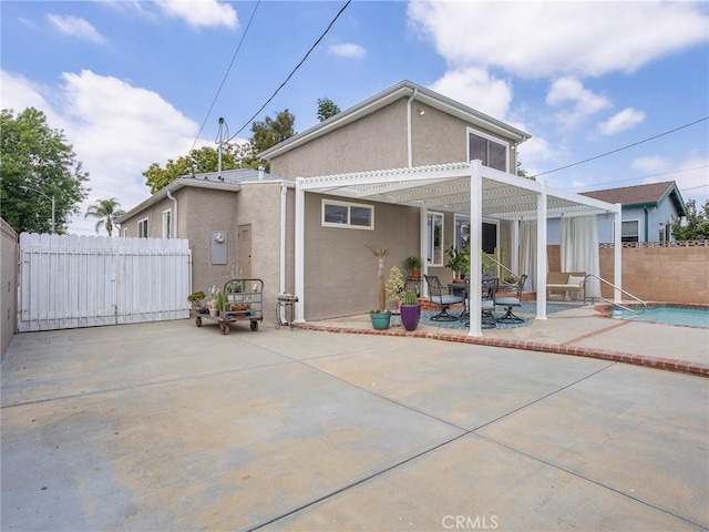 1234 N Pass Ave, Burbank, CA 91505 - rear view of property with fence, a pergola, stucco siding, and a patio