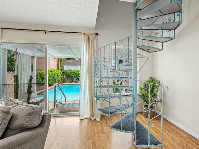 1234 N Pass Ave, Burbank, CA 91505 - interior space featuring baseboards, wood finished floors, and stairway