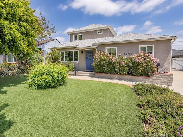 1234 N Pass Ave, Burbank, CA 91505 - view of front facade featuring a front lawn, stucco siding, and fence