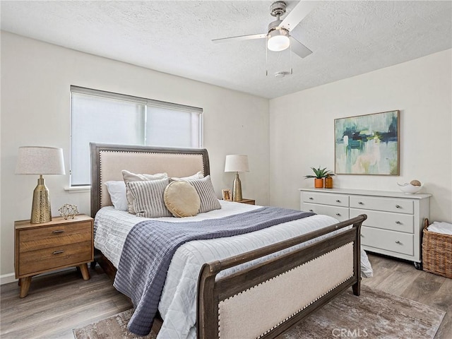 1234 N Pass Ave, Burbank, CA 91505 - bedroom featuring a textured ceiling, light wood-style flooring, and ceiling fan