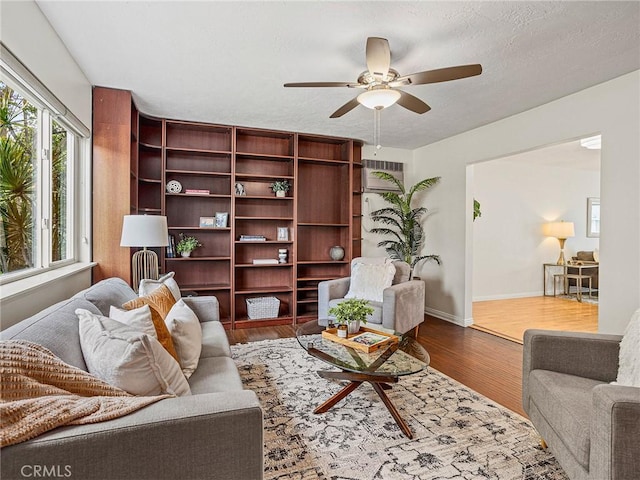 1234 N Pass Ave, Burbank, CA 91505 - living room featuring baseboards, a ceiling fan, and dark wood-style flooring