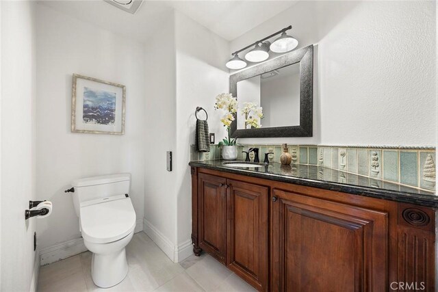 26930 Ironstone, Yorba Linda, CA 92887 - bathroom featuring toilet, baseboards, vanity, and tile patterned flooring