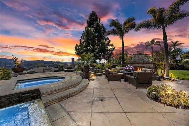 26930 Ironstone, Yorba Linda, CA 92887 - outdoor pool featuring a patio, an in-ground hot tub, and an outdoor living space with a fireplace