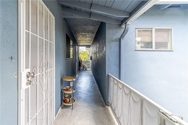 corridor featuring concrete floors