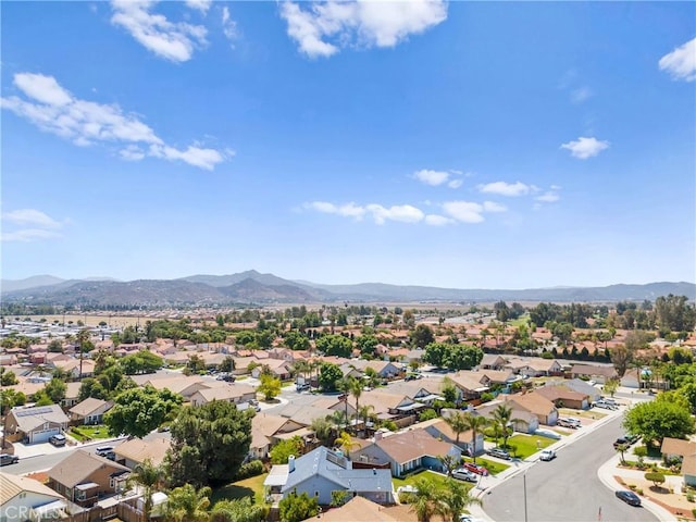 aerial perspective of suburban area featuring a mountainous background