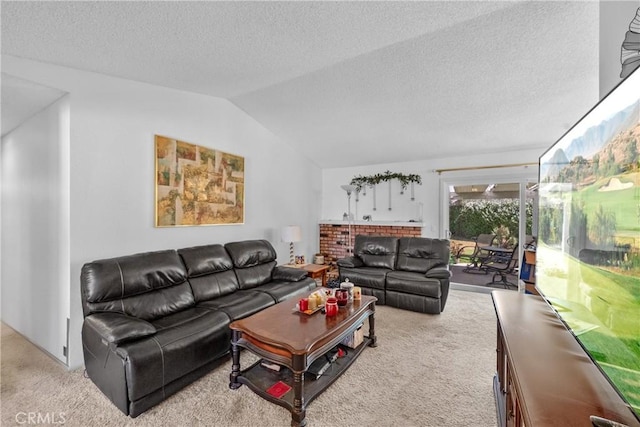 living room featuring carpet, vaulted ceiling, and a textured ceiling