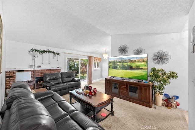 living room featuring carpet flooring, a brick fireplace, lofted ceiling, a textured ceiling, and baseboards