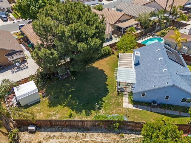 aerial perspective of suburban area with a pool
