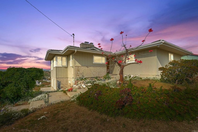 5884 Redondo Dr, Bonsall, CA 92003 - view of property exterior with a chimney