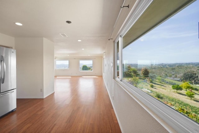 5884 Redondo Dr, Bonsall, CA 92003 - hallway featuring wood finished floors, recessed lighting, and baseboards