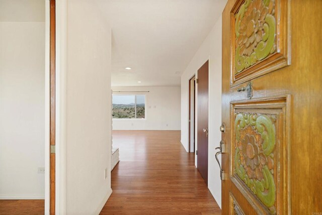 5884 Redondo Dr, Bonsall, CA 92003 - hall with wood finished floors and recessed lighting