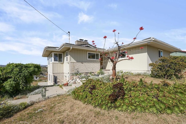 5884 Redondo Dr, Bonsall, CA 92003 - view of property exterior featuring a chimney