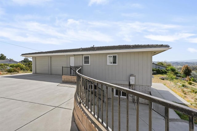 5884 Redondo Dr, Bonsall, CA 92003 - back of house featuring a garage