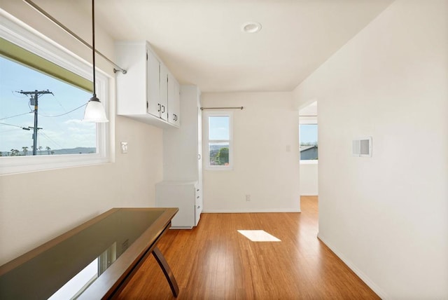5884 Redondo Dr, Bonsall, CA 92003 - corridor featuring light wood finished floors and baseboards