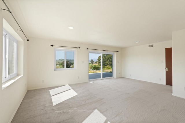 5884 Redondo Dr, Bonsall, CA 92003 - empty room with light carpet, recessed lighting, and baseboards
