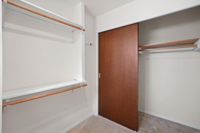 5884 Redondo Dr, Bonsall, CA 92003 - walk in closet featuring carpet floors