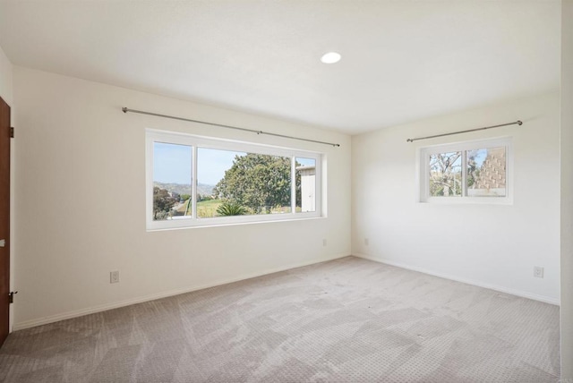 5884 Redondo Dr, Bonsall, CA 92003 - unfurnished room featuring healthy amount of natural light, light colored carpet, baseboards, and recessed lighting