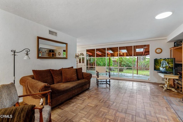 living room with visible vents