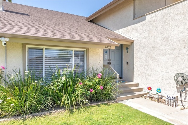 1452 Granada, Corona, CA 92878 - property entrance featuring roof with shingles and stucco siding