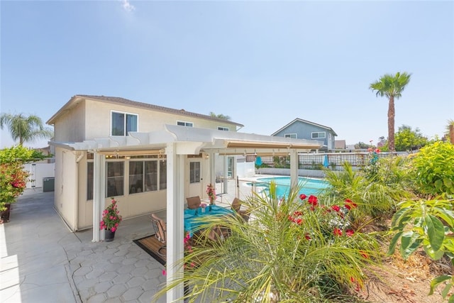 1452 Granada, Corona, CA 92878 - back of house with a pergola, a patio area, a fenced backyard, and stucco siding