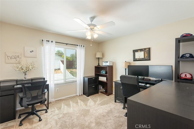 1452 Granada, Corona, CA 92878 - home office featuring a ceiling fan, light carpet, and baseboards