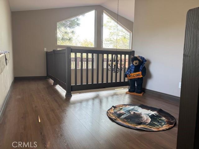 373 Davos Dr, Crestline, CA 92325 - interior space featuring baseboards, wood finished floors, and lofted ceiling
