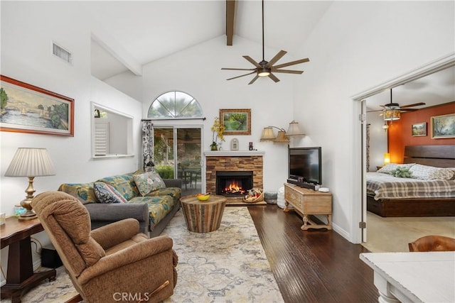 42065 Kaffirboom Ct, Temecula, CA 92591 - living area with a ceiling fan, beam ceiling, high vaulted ceiling, a fireplace, and dark wood-style flooring