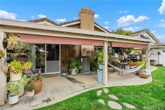 42065 Kaffirboom Ct, Temecula, CA 92591 - rear view of house featuring a patio area and a tiled roof