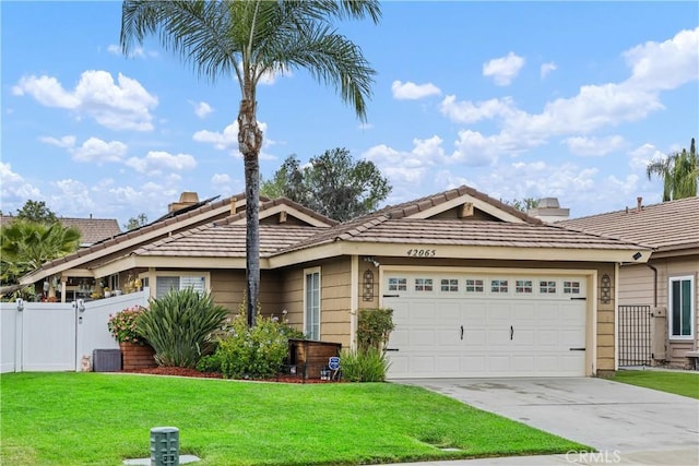 42065 Kaffirboom Ct, Temecula, CA 92591 - ranch-style house featuring a garage, a tile roof, concrete driveway, and a gate