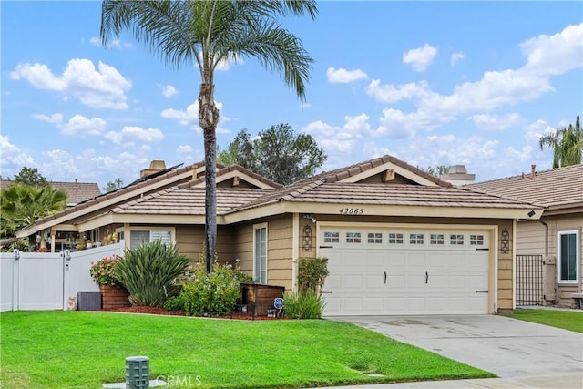 42065 Kaffirboom Ct, Temecula, CA 92591 - single story home with a garage, a tile roof, concrete driveway, and a gate