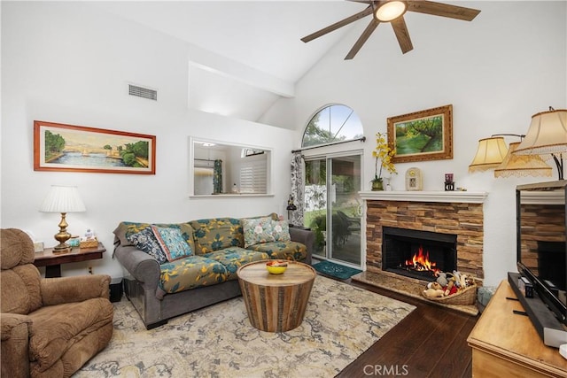 42065 Kaffirboom Ct, Temecula, CA 92591 - living area with hardwood / wood-style flooring, a ceiling fan, a stone fireplace, high vaulted ceiling, and beamed ceiling