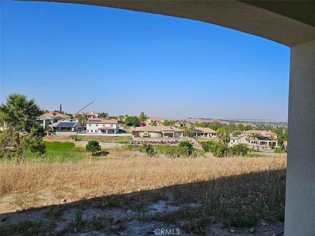 view of yard featuring a residential view