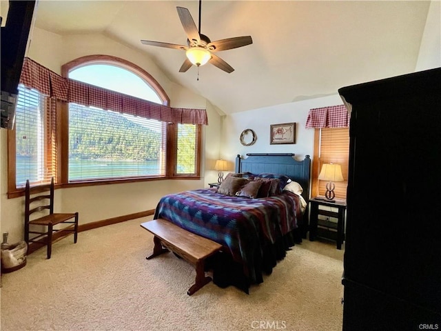 bedroom featuring carpet floors, ceiling fan, and vaulted ceiling