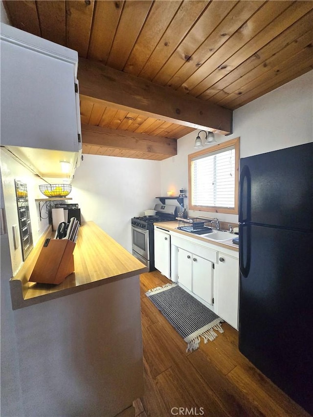143 Cedar Ln, Sugarloaf, CA 92386 - kitchen with freestanding refrigerator, a sink, stainless steel range with gas stovetop, dark wood-style flooring, and wooden ceiling