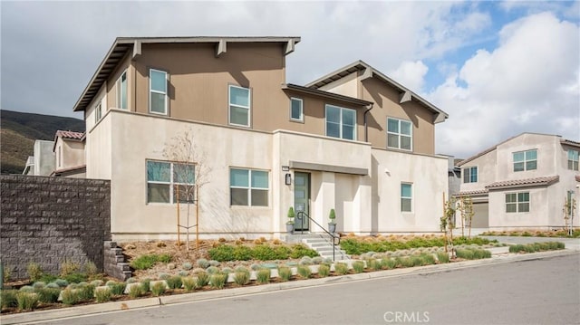 15820 Caterpillar Dr, Fontana, CA 92336 - view of front of home featuring stucco siding