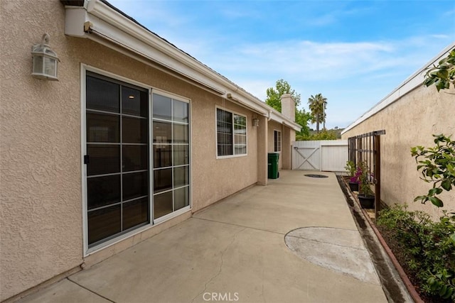 6192 Sierra Siena Rd, Irvine, CA 92603 - view of patio / terrace featuring a gate and fence