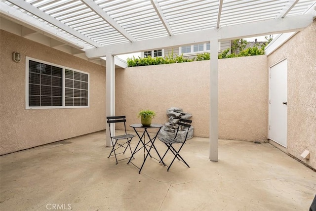 6192 Sierra Siena Rd, Irvine, CA 92603 - view of patio featuring fence, a pergola, and outdoor dining space