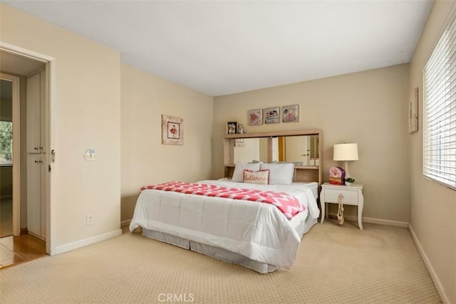 6192 Sierra Siena Rd, Irvine, CA 92603 - carpeted bedroom featuring baseboards and multiple windows